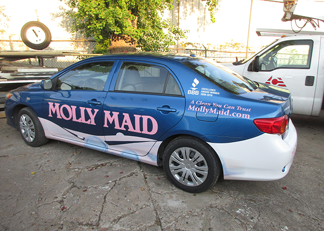 Bright Blue and Pink Molly Maid Car Wrap